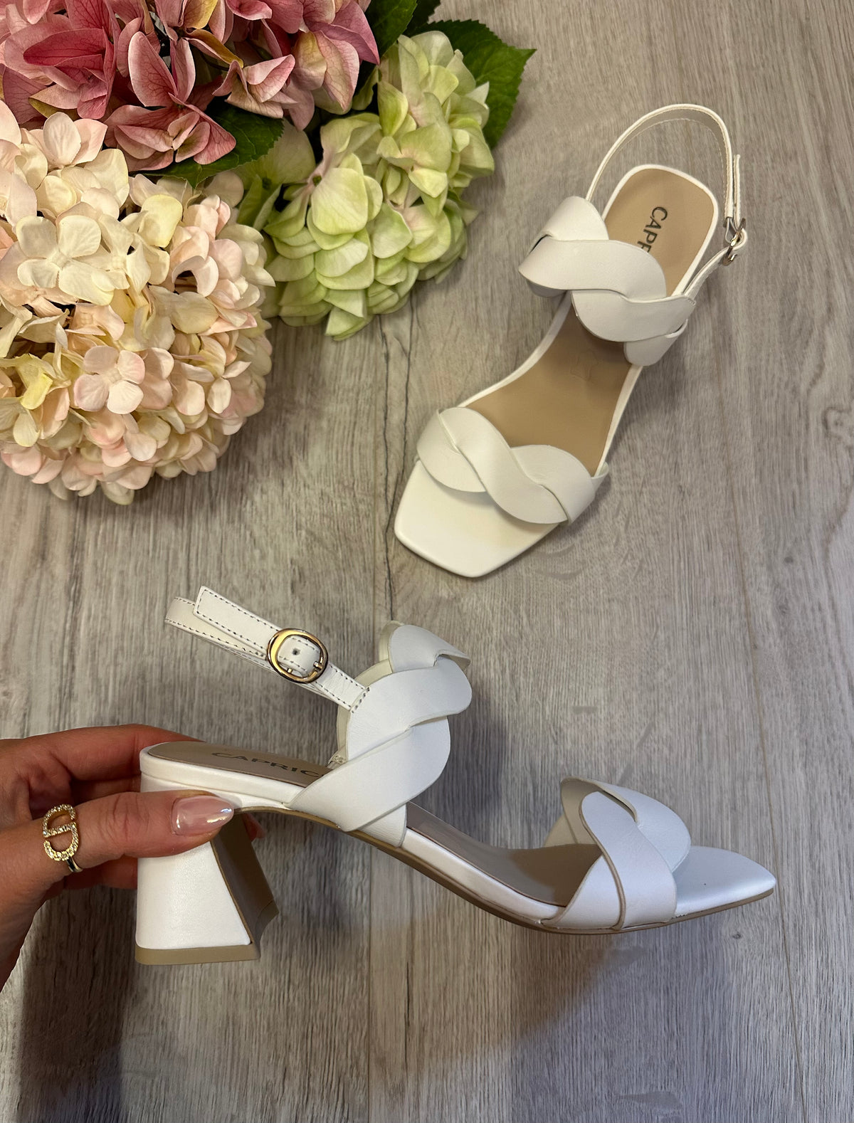 Caprice Twist Strap Leather Sandals In White