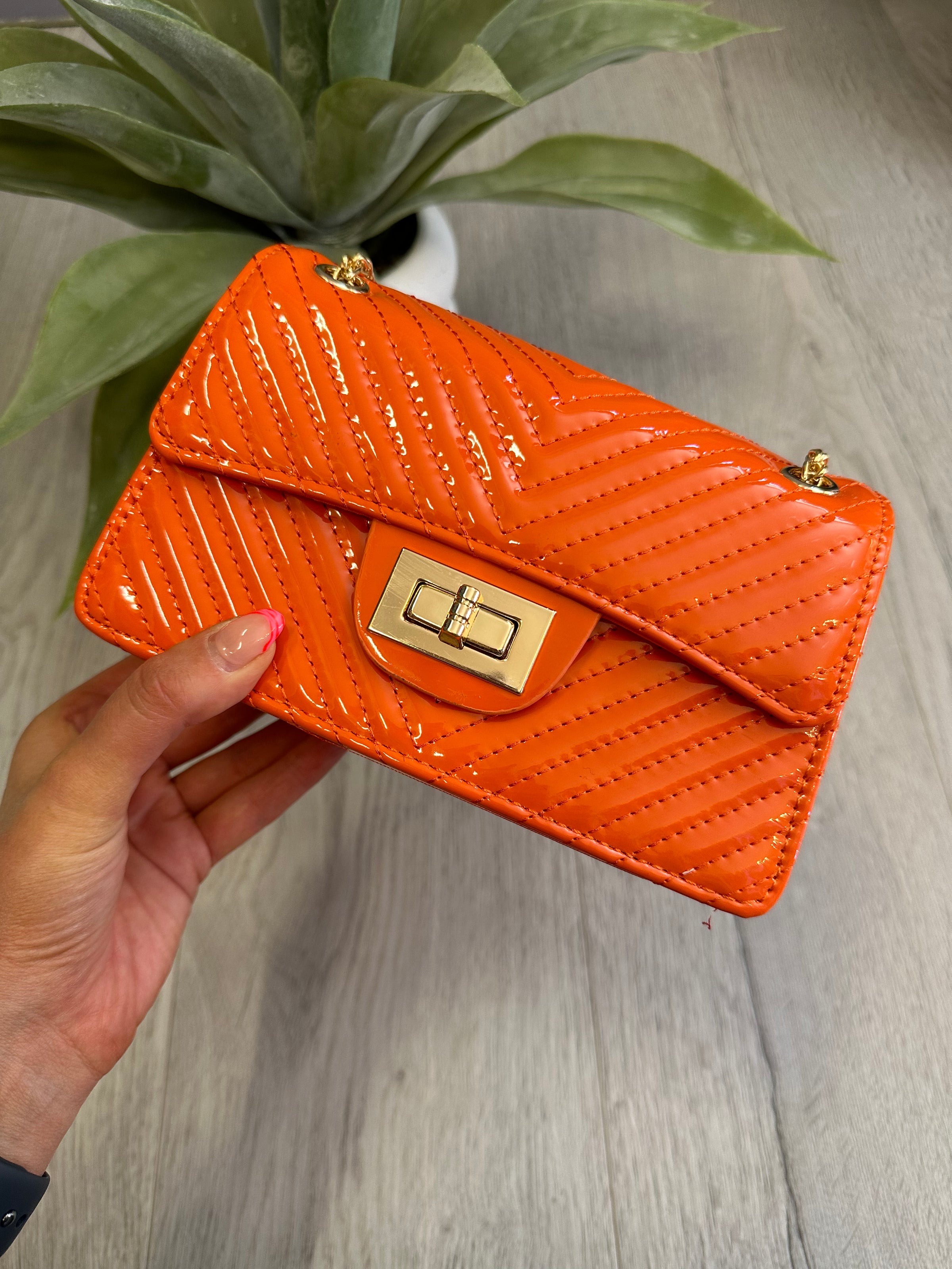 Mia Patent Handbag In Orange